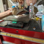 Raw lacquer being added to deer antler powder.
