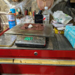 Water and rice glue being added to mixed lacquer and deer antler powder for initial lacquer cement coat.